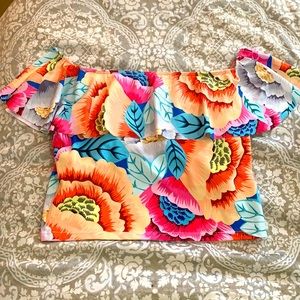 Off the shoulder (can be worn on shoulders too)